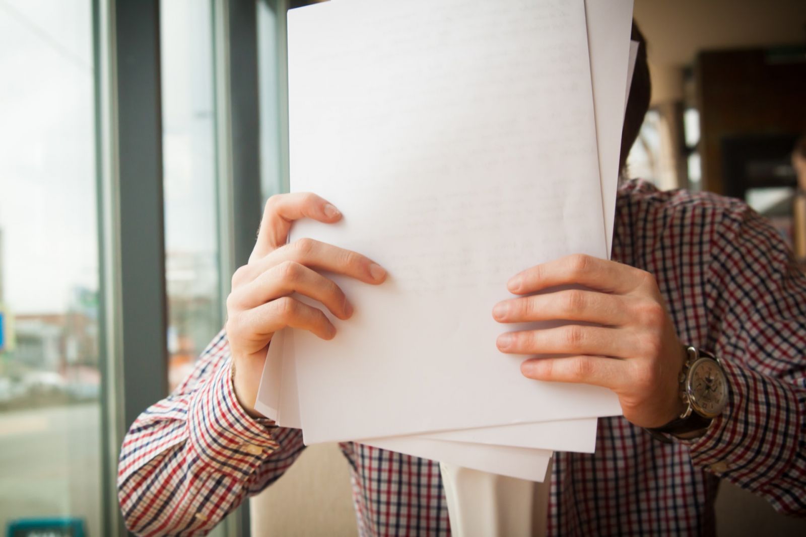 man reviewing printing costs